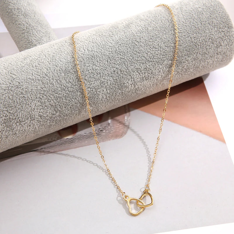 Colar Feminino de Coração Duplo Oco – Design Minimalista banho em Ouro 18K